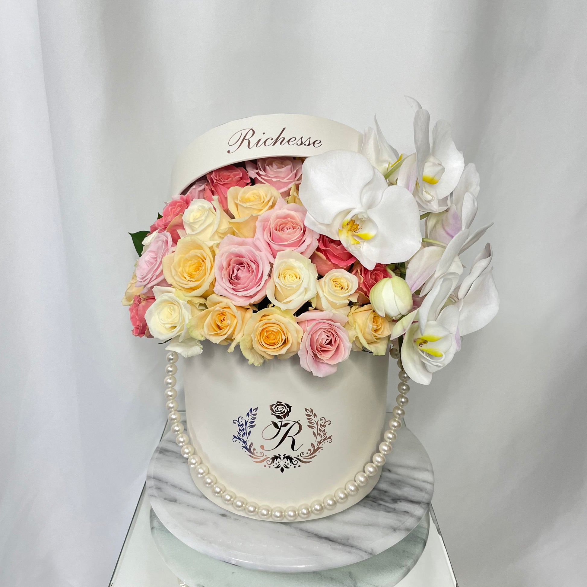 ピンクと淡いオレンジのアレンジメントMサイズ【S様オーダーメイド